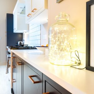 A close-up internal view of the kitchen worktop extended into the dining room to form a sideboard.